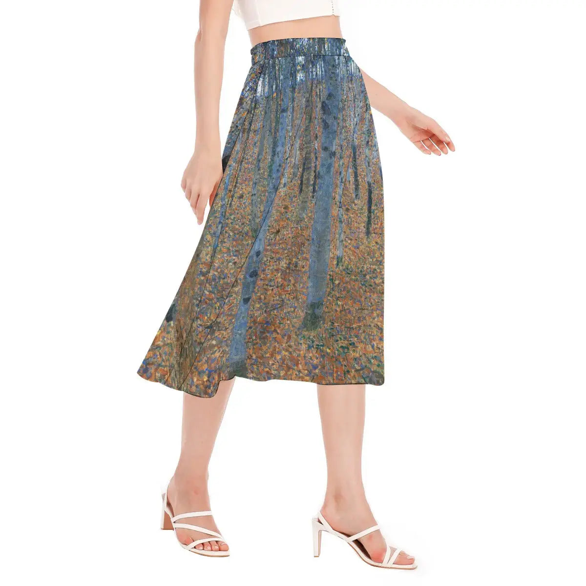 Woman wearing Gustav Klimt Beech Grove I Chiffon Skirt with earth-toned blouse in nature park setting