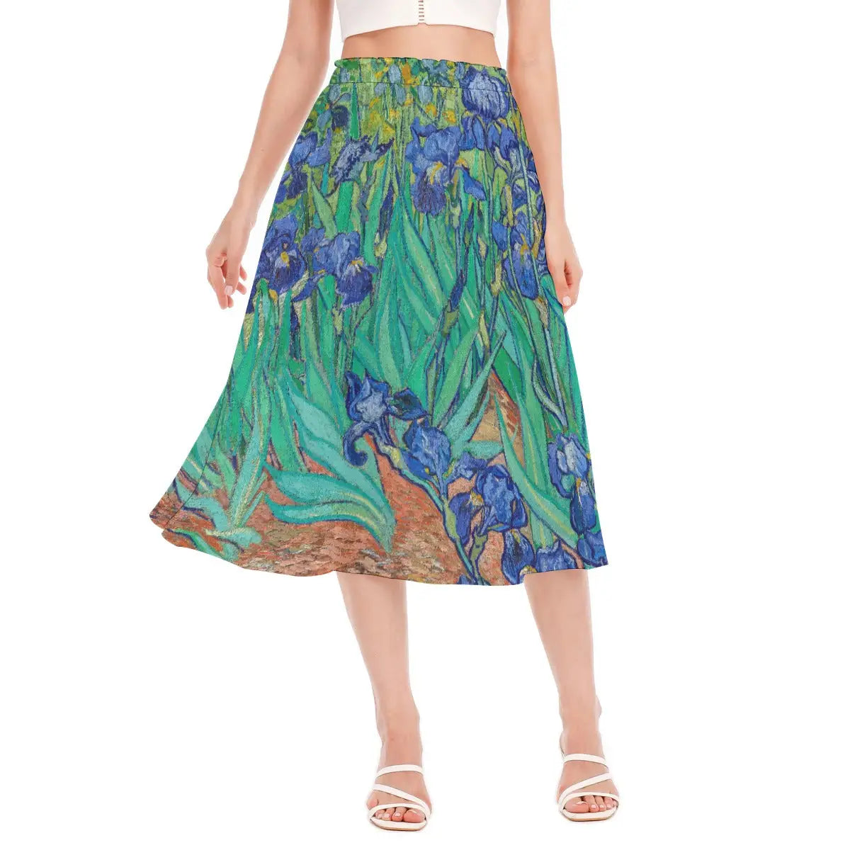 Woman wearing Irises by Vincent van Gogh recycled polyester chiffon skirt with the vibrant blue flowers clearly visible against natural light.