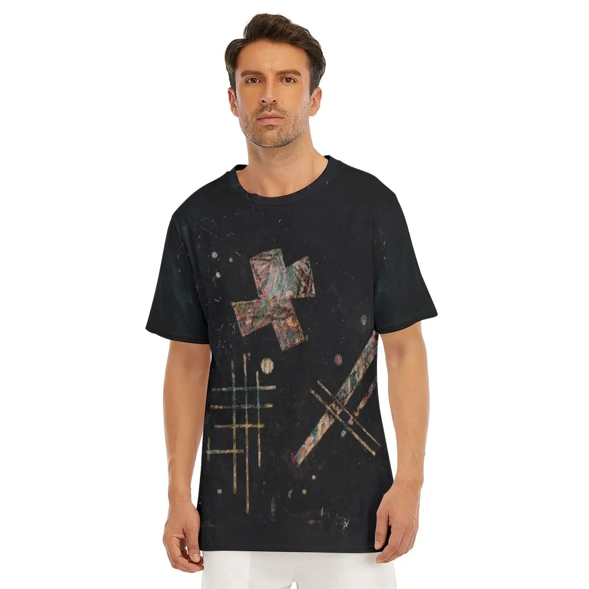 Male model wearing the Isolated Sounds by Wassily Kandinsky All-Over Print T-shirt showcasing the bold black and white contrasts of this revolutionary woodcut from the artist's groundbreaking 1913 "Klänge" (Sounds) publication.
