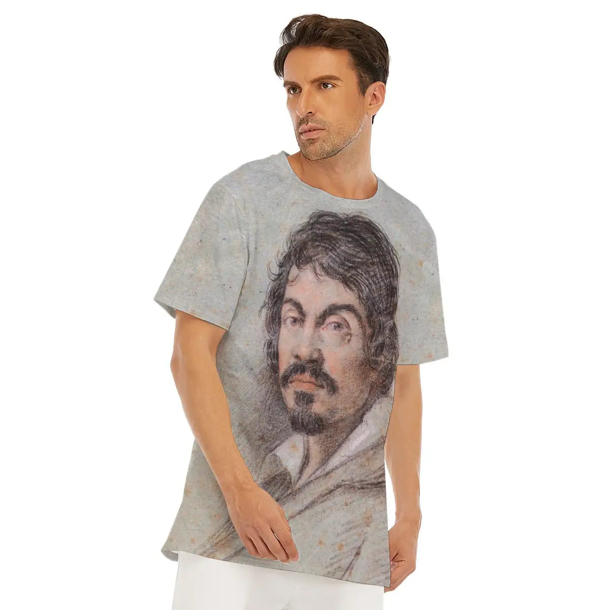 Caravaggio self-portrait T-shirt laid flat, displaying the entire Baroque masterpiece, premium craftsmanship, and natural texture of the 100% cotton fabric that enhances the dramatic quality of the reproduced artwork.