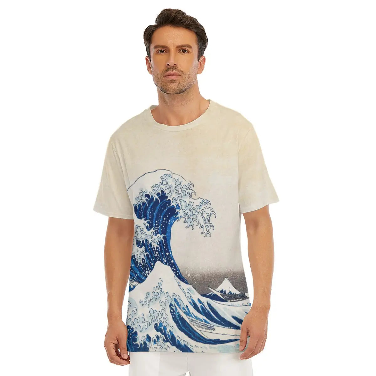 Male model wearing The Great Wave off Kanagawa All-Over Print T-shirt showcasing Hokusai's dramatic composition with its towering wave and small Mount Fuji in the distance, rendered in striking Prussian blue
