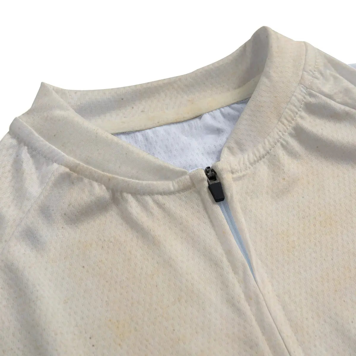 Close-up of secure non-slip rubber hem on Great Wave cycling jersey maintaining position during ride