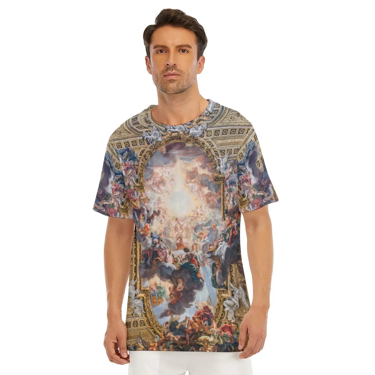 Male model wearing the Triumph of the Name of Jesus All-Over Print T-shirt showcasing Giovanni Battista Gaulli's magnificent Baroque fresco with golden divine light radiating from the IHS monogram