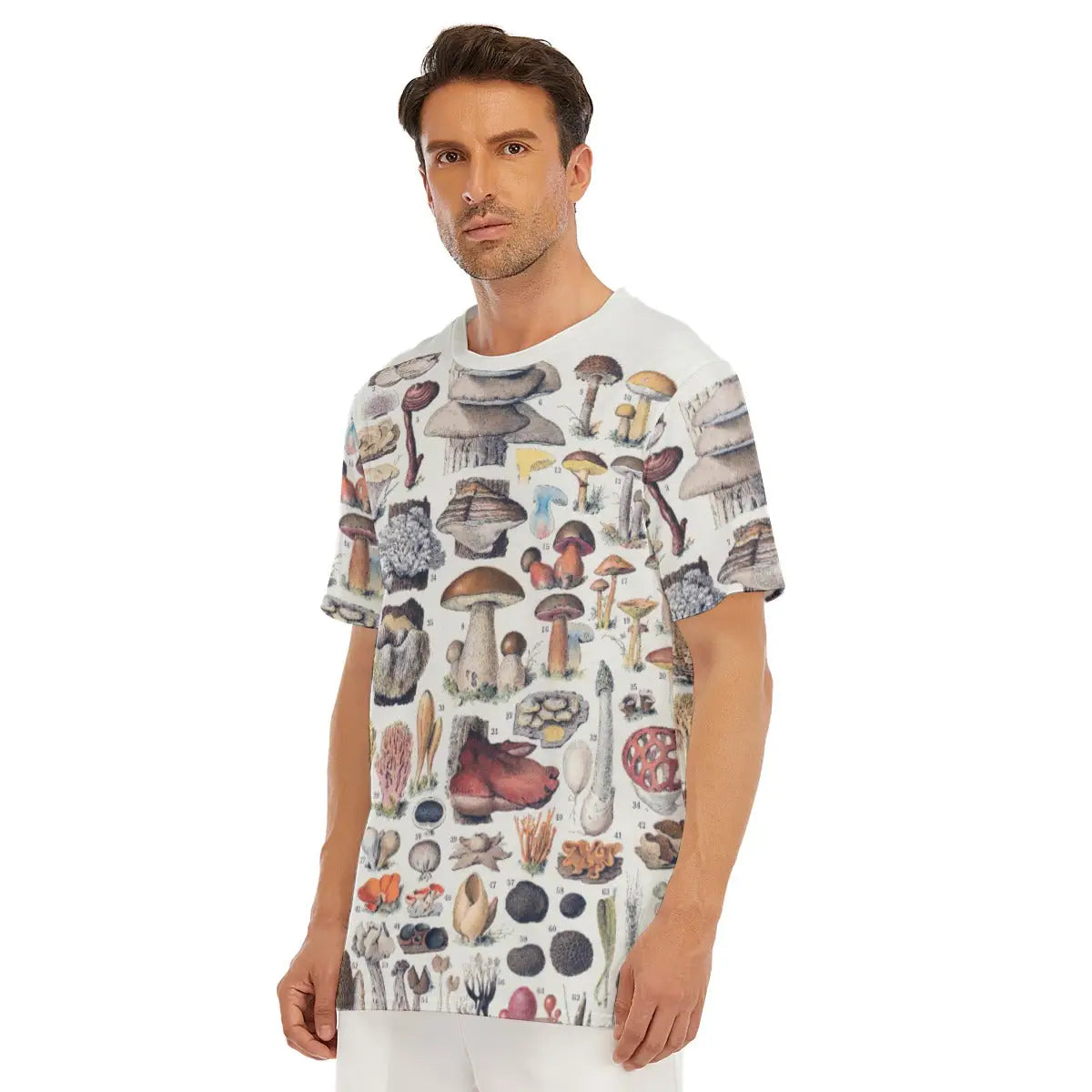 Types of Mushrooms T-shirt laid flat, displaying the entire botanical fungi collection, premium craftsmanship, and natural texture of the 100% cotton fabric against a neutral surface