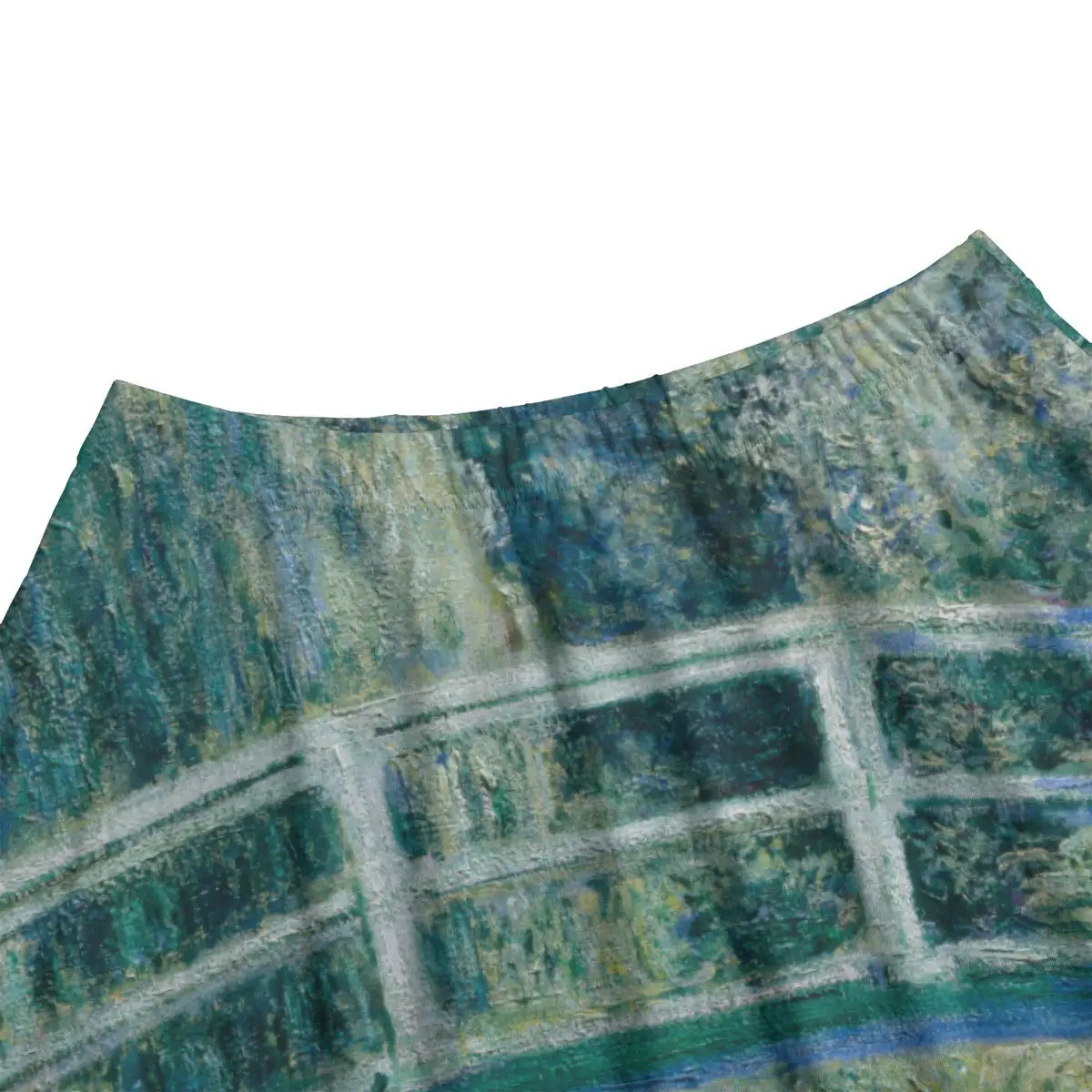 Close-up of delicate lily pads and reflective water details from Monet's beloved garden masterpiece beautifully rendered on premium fabric