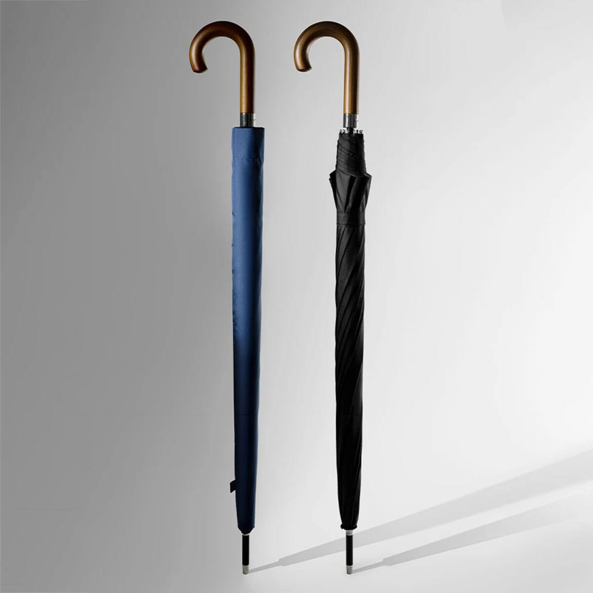 Black extra large umbrella with wooden handle detail