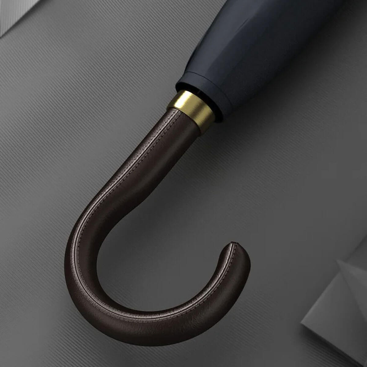 Close-up of luxurious leather handle on Enchanted Elegance Umbrella