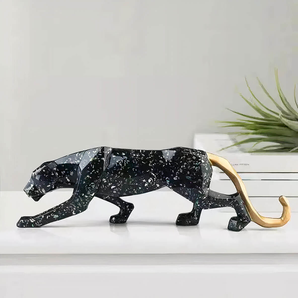 Black Leopard Sculpture displayed on living room shelf - statement piece