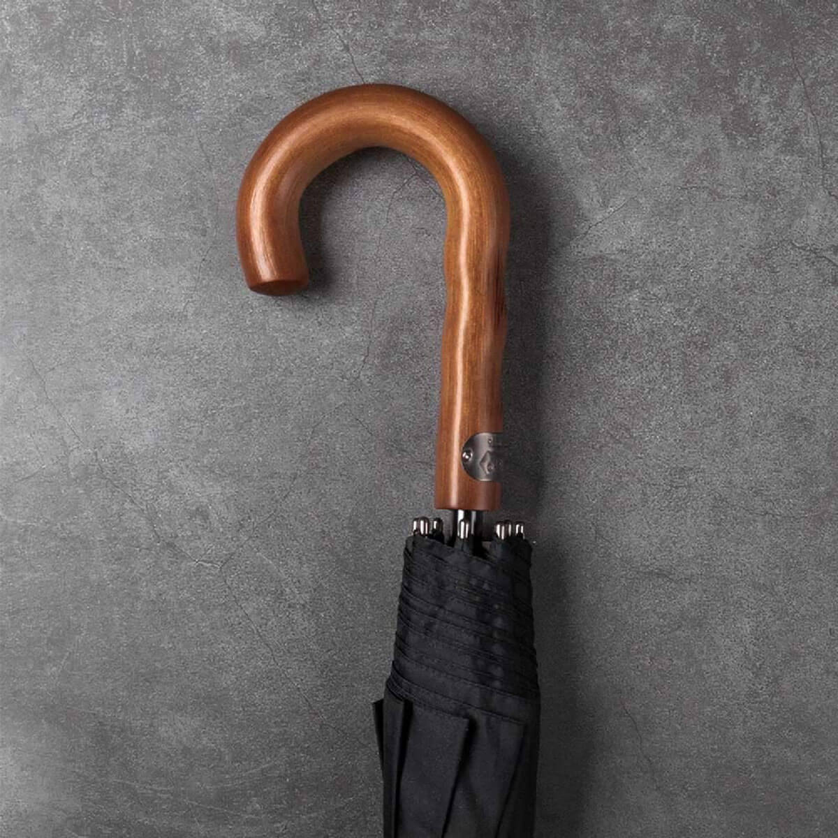 Crafted with a luxurious wooden handle
