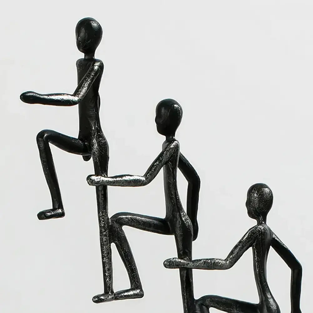 Top view of Modern Minimalist Sculpture highlighting 8 climbing figures and artistic design