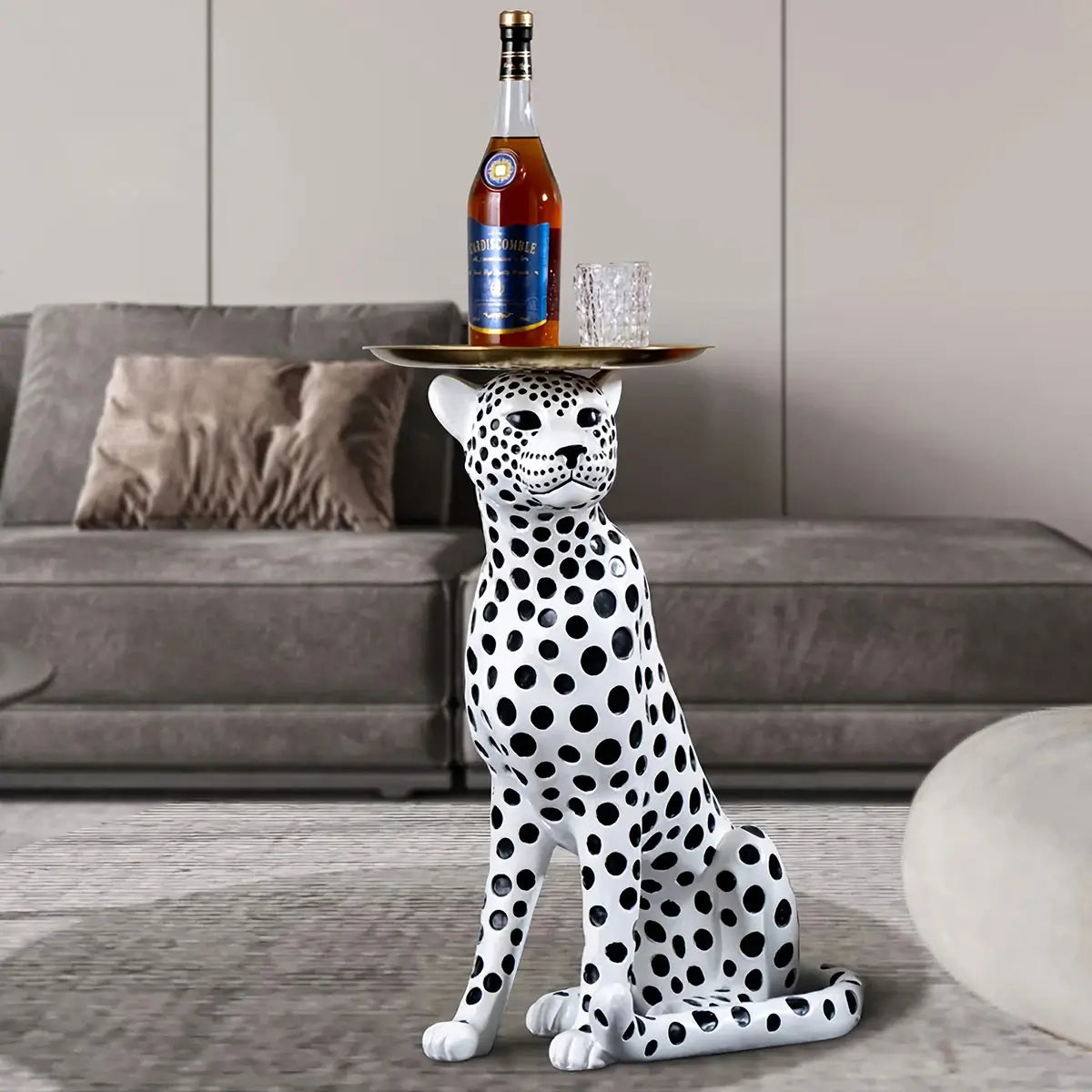 Leopard Side Table in modern living room setting with decorative items