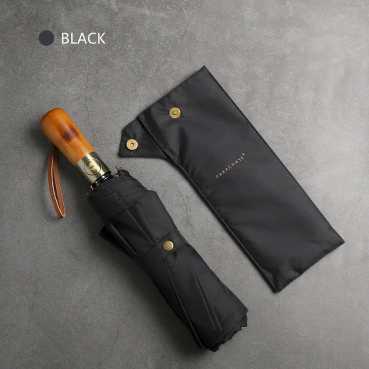 Navy blue folding umbrella showcasing premium quality materials