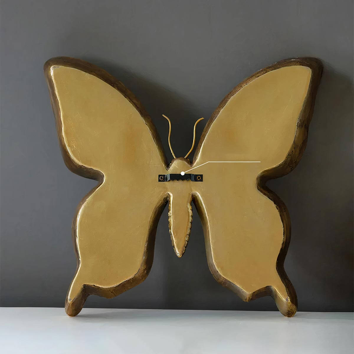 Reflective wall art with golden butterfly frame