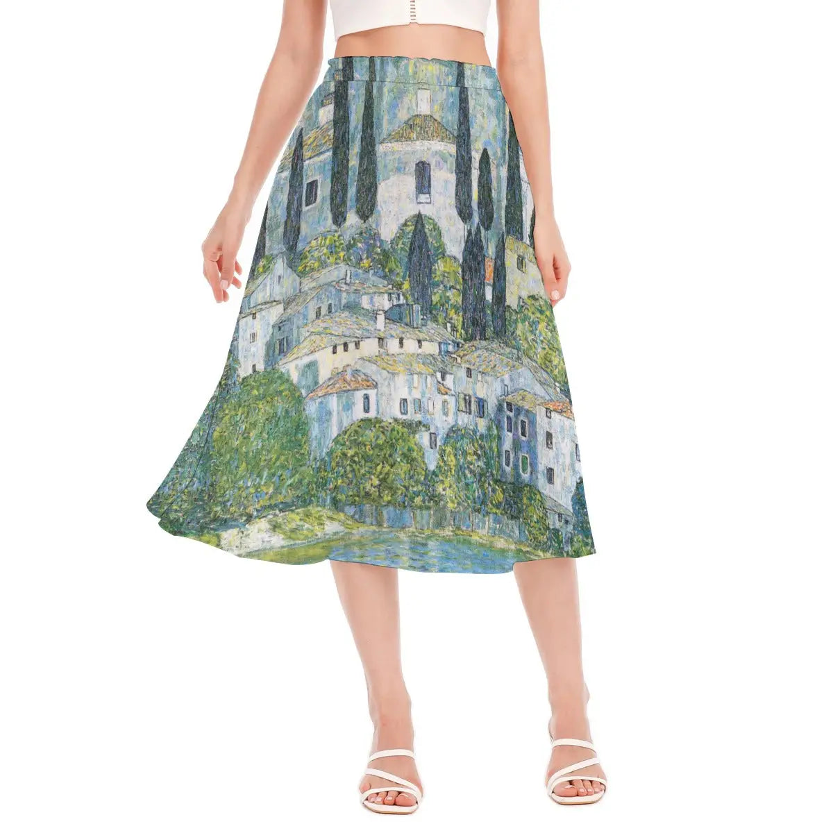 Woman wearing Church in Cassone by Gustav Klimt recycled polyester chiffon skirt with the vibrant Lake Garda village scene clearly visible against natural light.