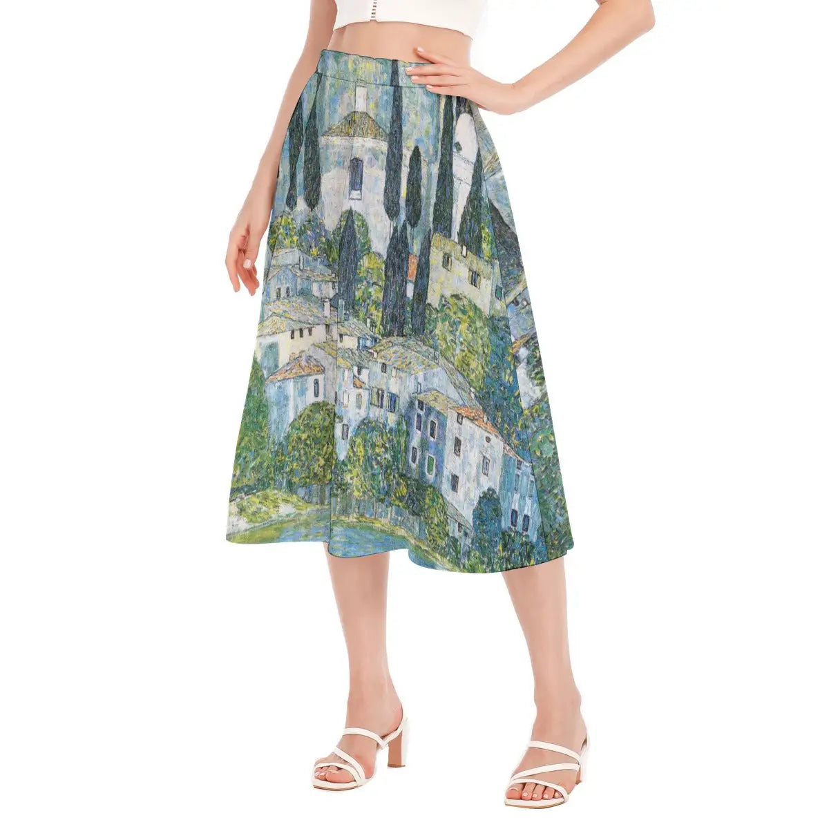 Full-length photo of flowing eco-friendly skirt featuring Klimt's Mediterranean masterpiece paired with an olive green top that complements the dominant colors of the cypress trees.