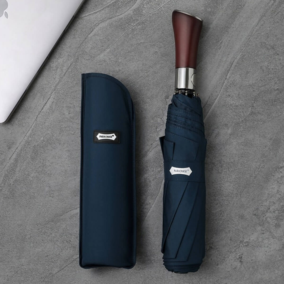 Side-by-side comparison of black, grey, navy, and green large umbrellas