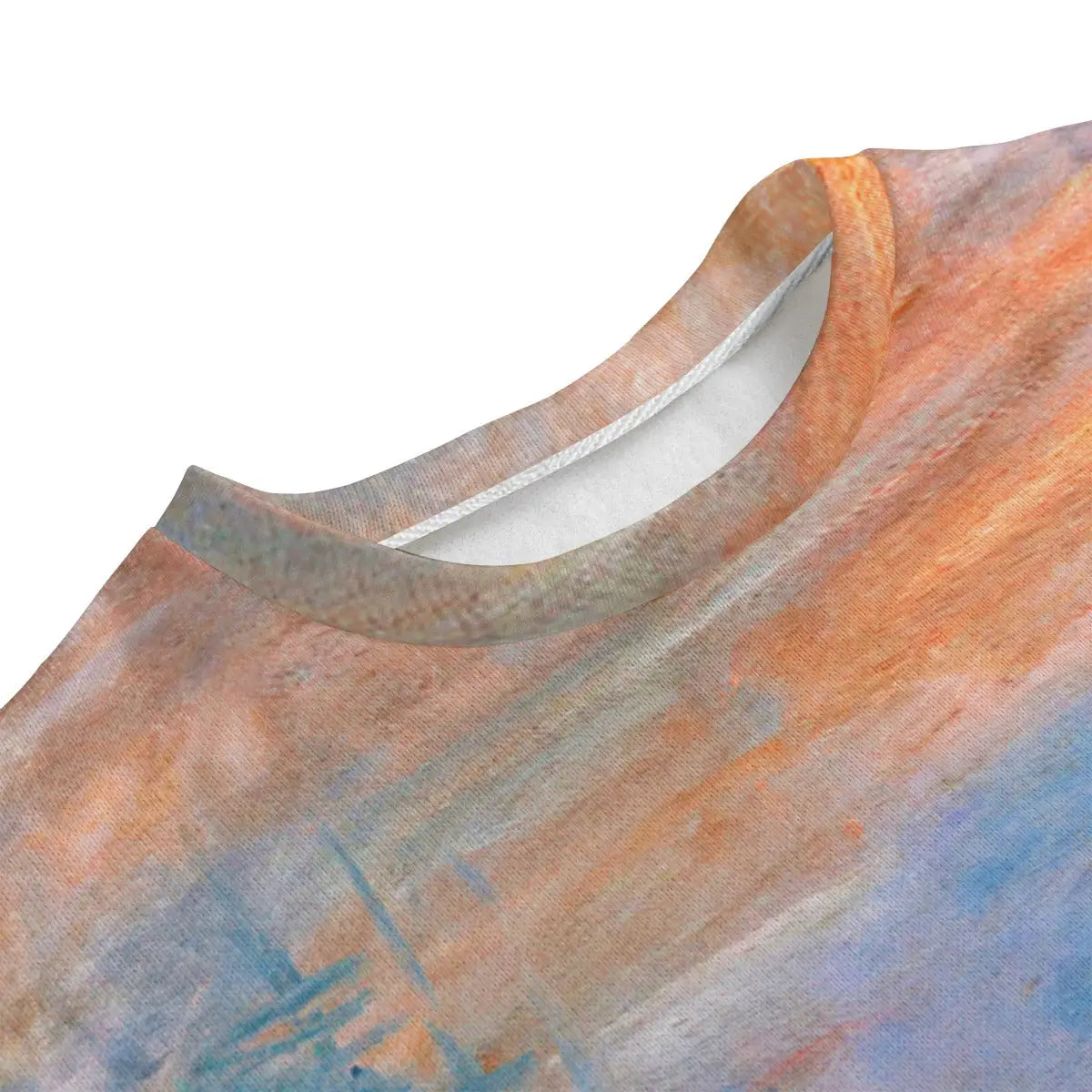 Detail of Monet's orange sun and misty harbor printed on Hacci Fleece sweater