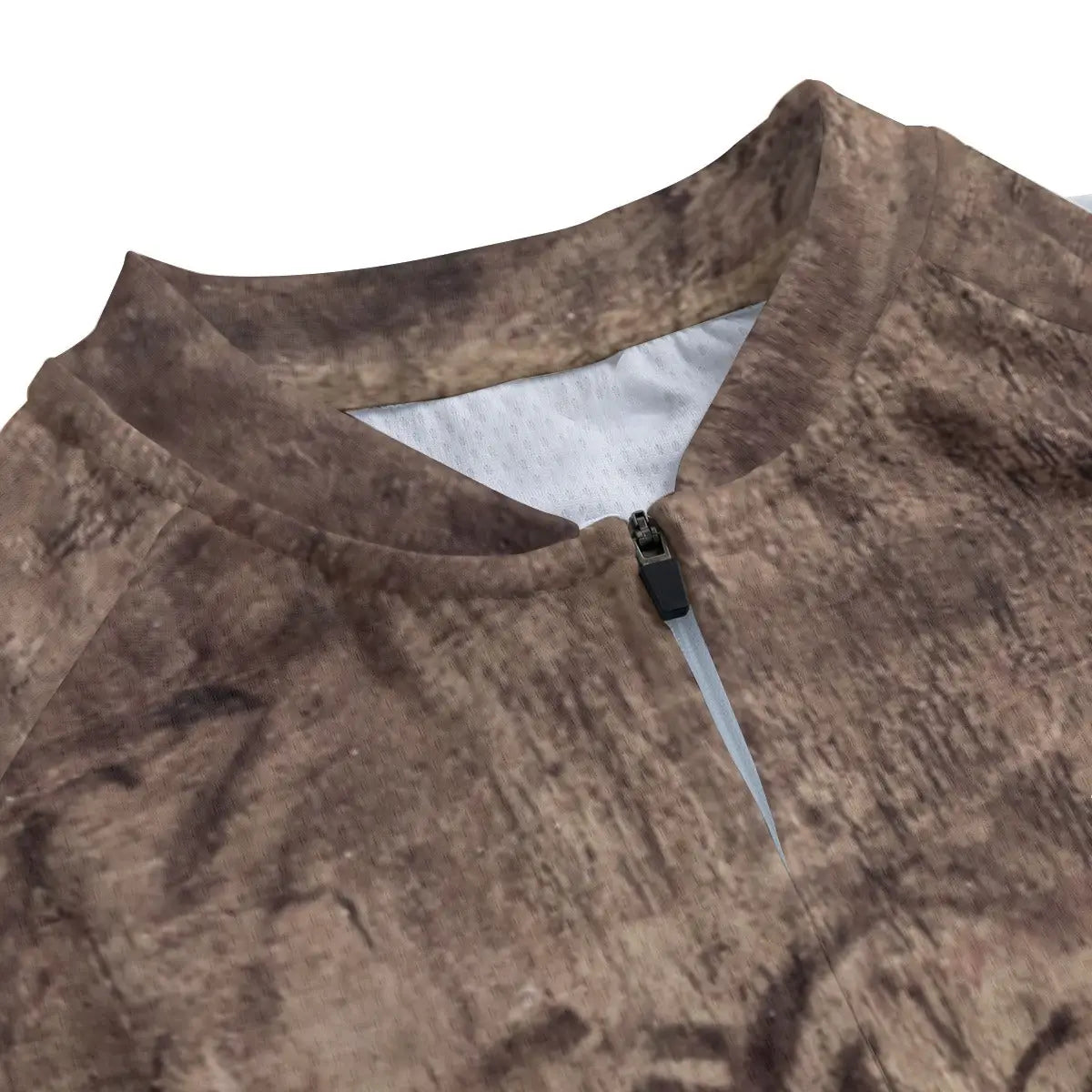 Close-up of secure non-slip rubber hem on Renaissance portrait cycling jersey maintaining position during contemplative ride