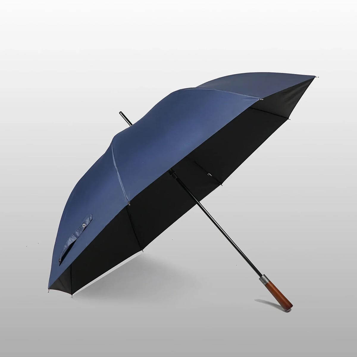 Navy blue 122cm umbrella protecting against rain