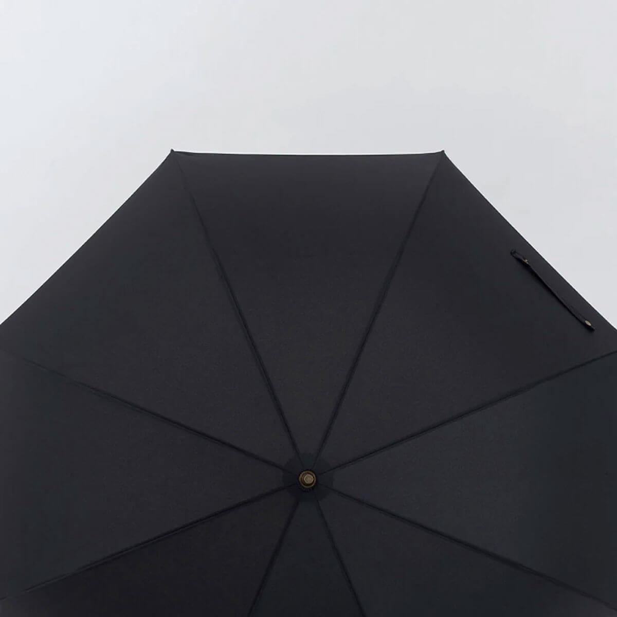 Timeless elegance in a classic rain accessory.