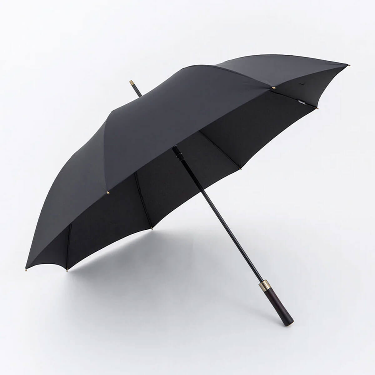 Elegant rain accessory with classic charm.