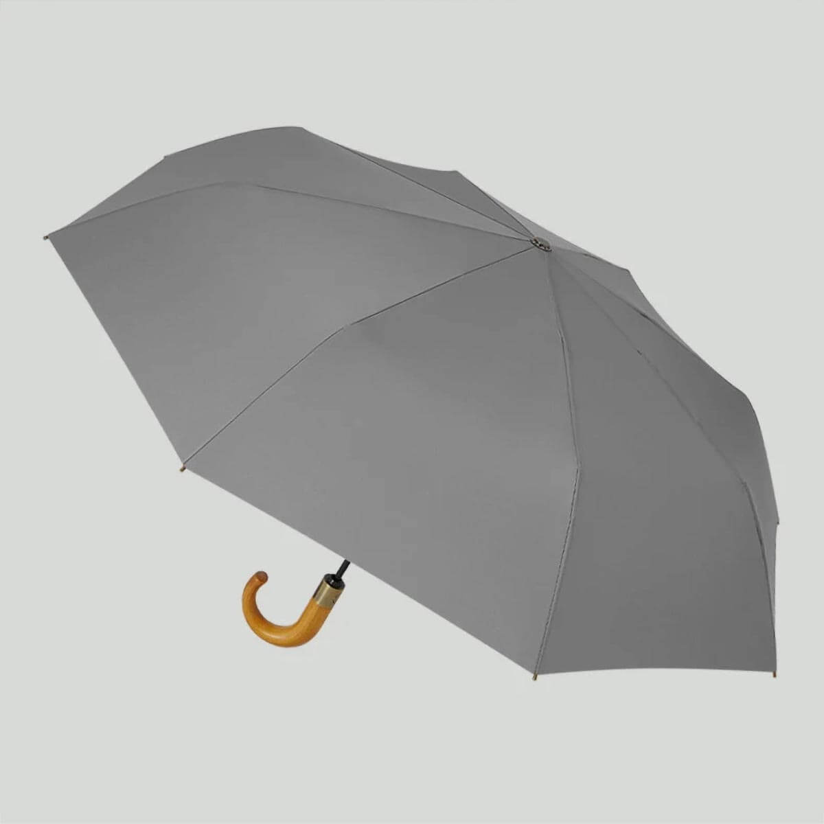 Automatic Foldable Umbrella withstanding strong winds, showcasing its strength