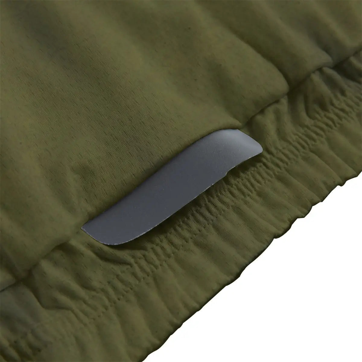Close-up of secure non-slip rubber hem on Baroque art cycling jersey maintaining position during intense effort