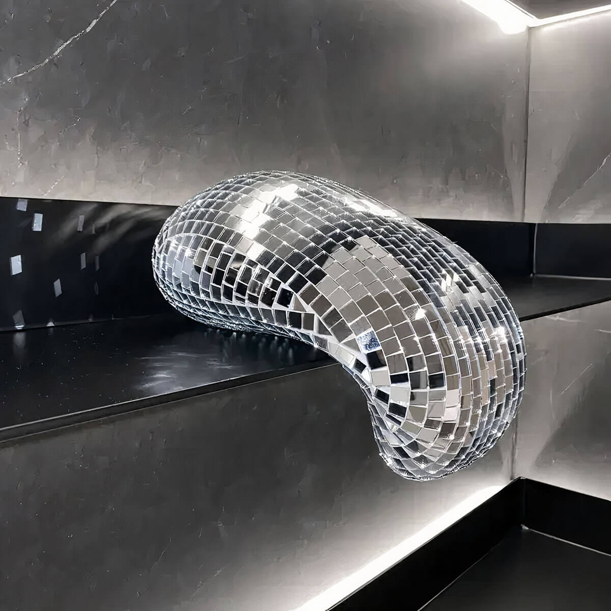 Unique home decor: Melting Disco Ball Sculpture creating optical illusion