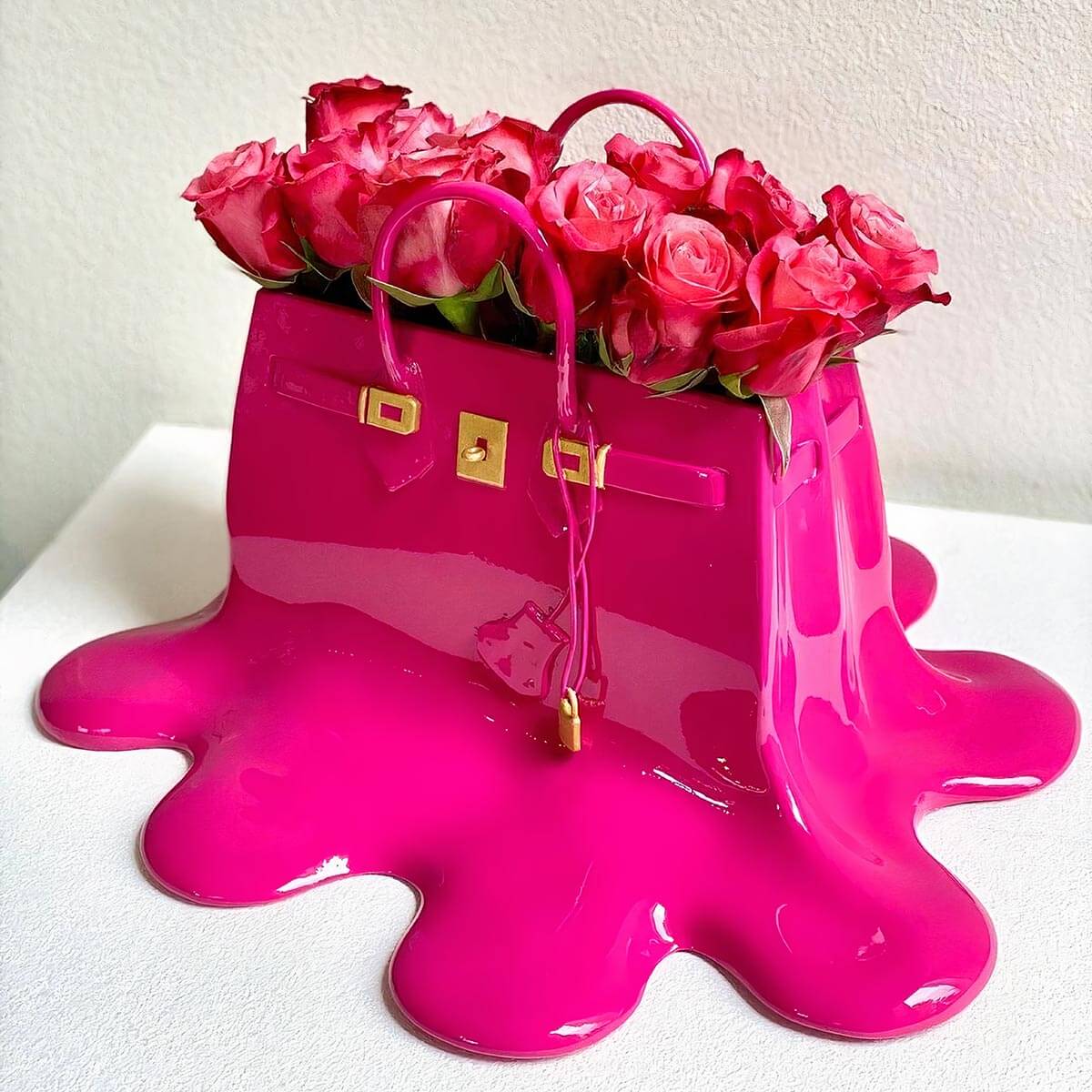 Designer handbag-shaped flower container in modern interior