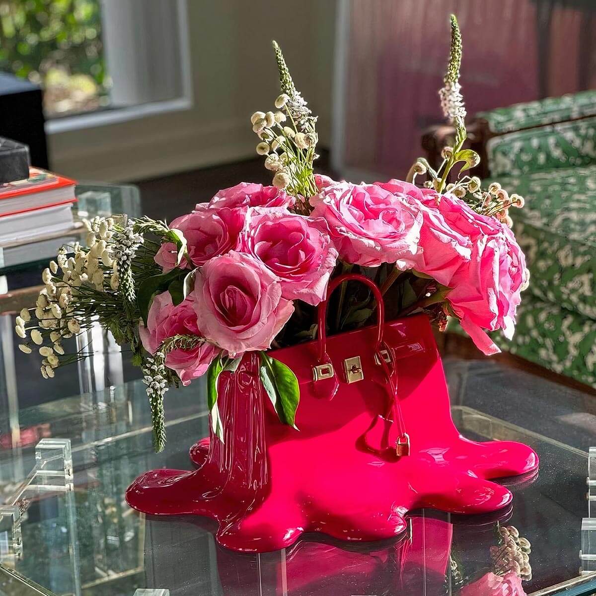 Elegant melting handbag flower vase in living room setting