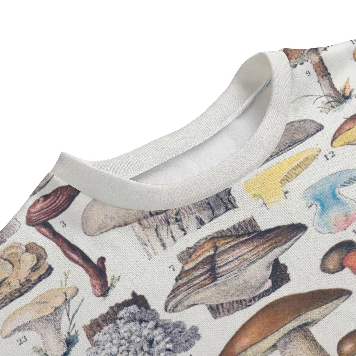 Close-up detail of edible mushroom botanical illustrations on sustainable Hacci Fleece sweater