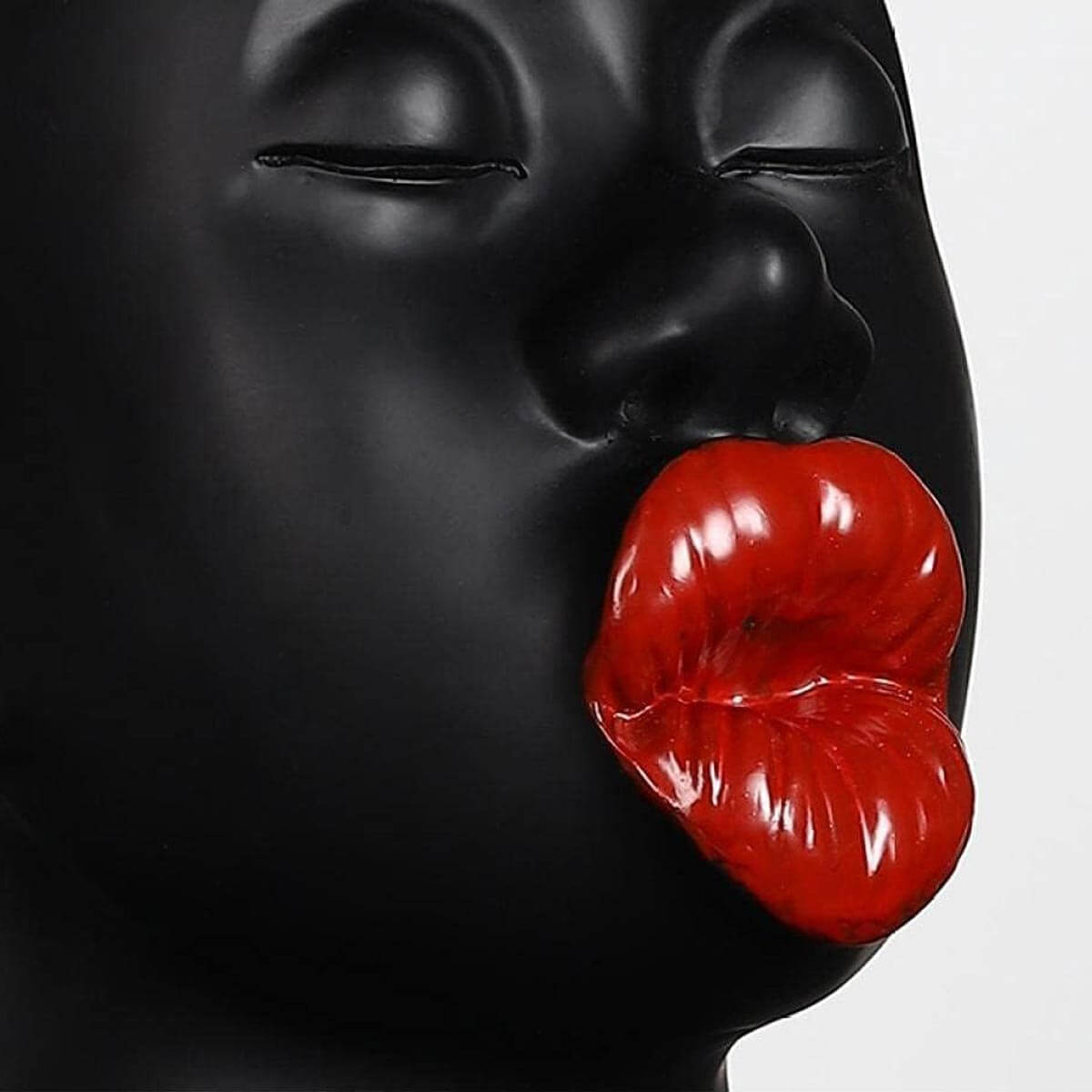 Unique angle of Red Lips Sculpture emphasizing its bold design and artistic appeal