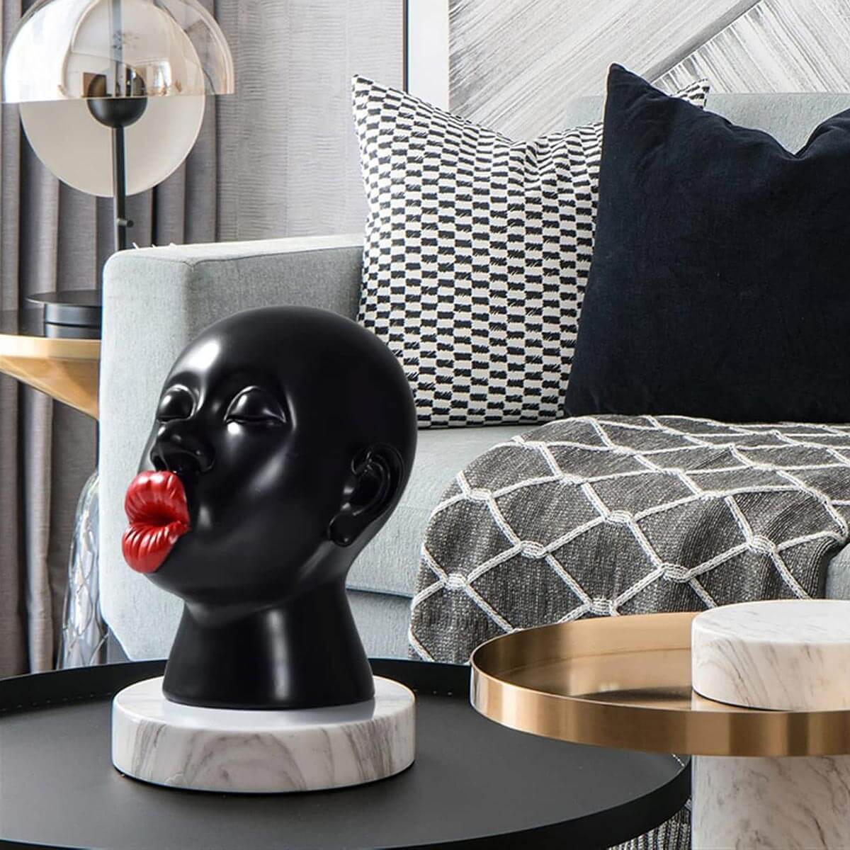 Red Lips Sculpture as statement piece on living room bookshelf, adding modern flair