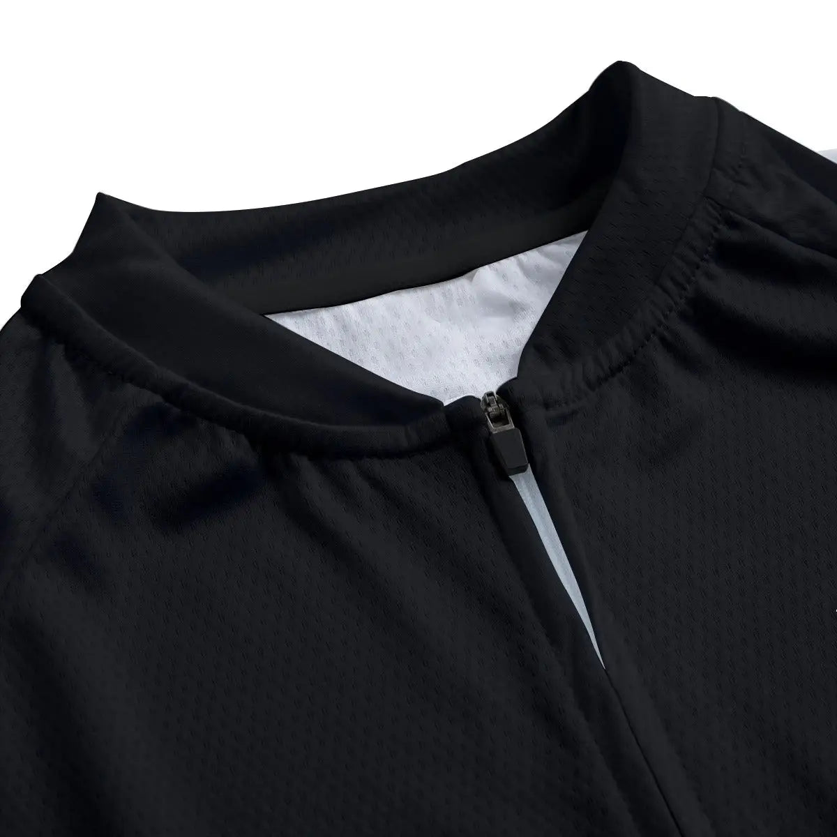 Close-up of secure non-slip rubber hem on symbolist art cycling jersey maintaining position during transcendent ride