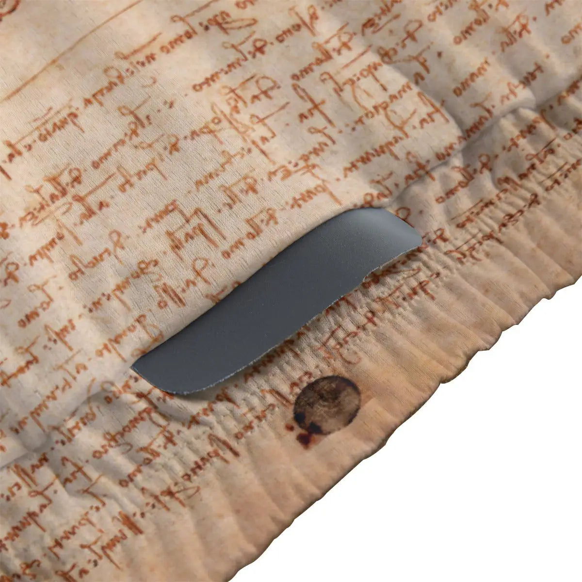 Close-up of secure non-slip rubber hem on Renaissance scientific art cycling jersey maintaining precise position